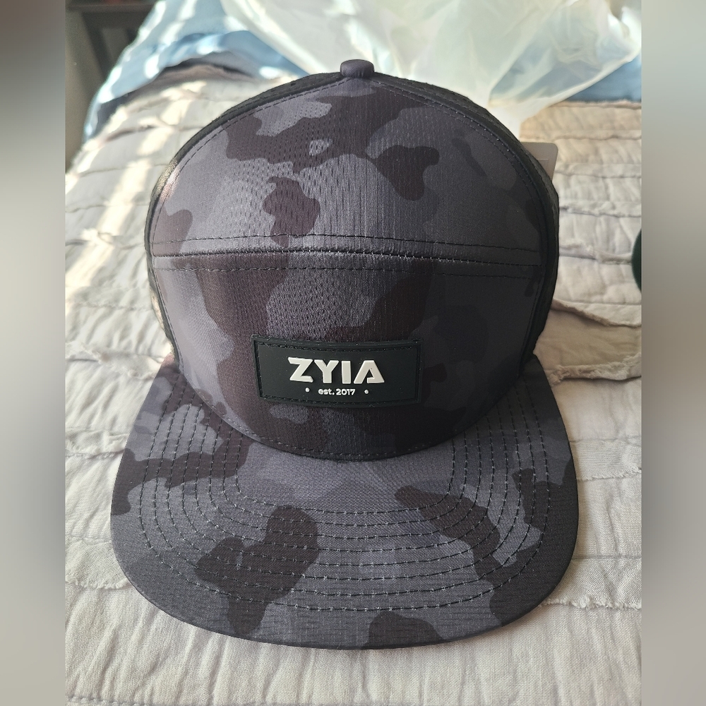 Zyia camo vortex snapback hat, brand new with tags and in bag.